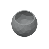 Close-up of low poly bowl showing cracked stone-inspired geometric facets and subtle shadow play