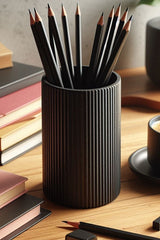 Ribbed pencil holder close-up showing vertical texture and neutral finish