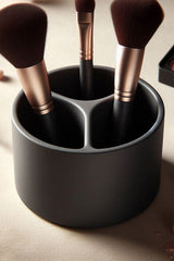 White minimalist makeup brush holder with brushes inside, clean cylindrical shape