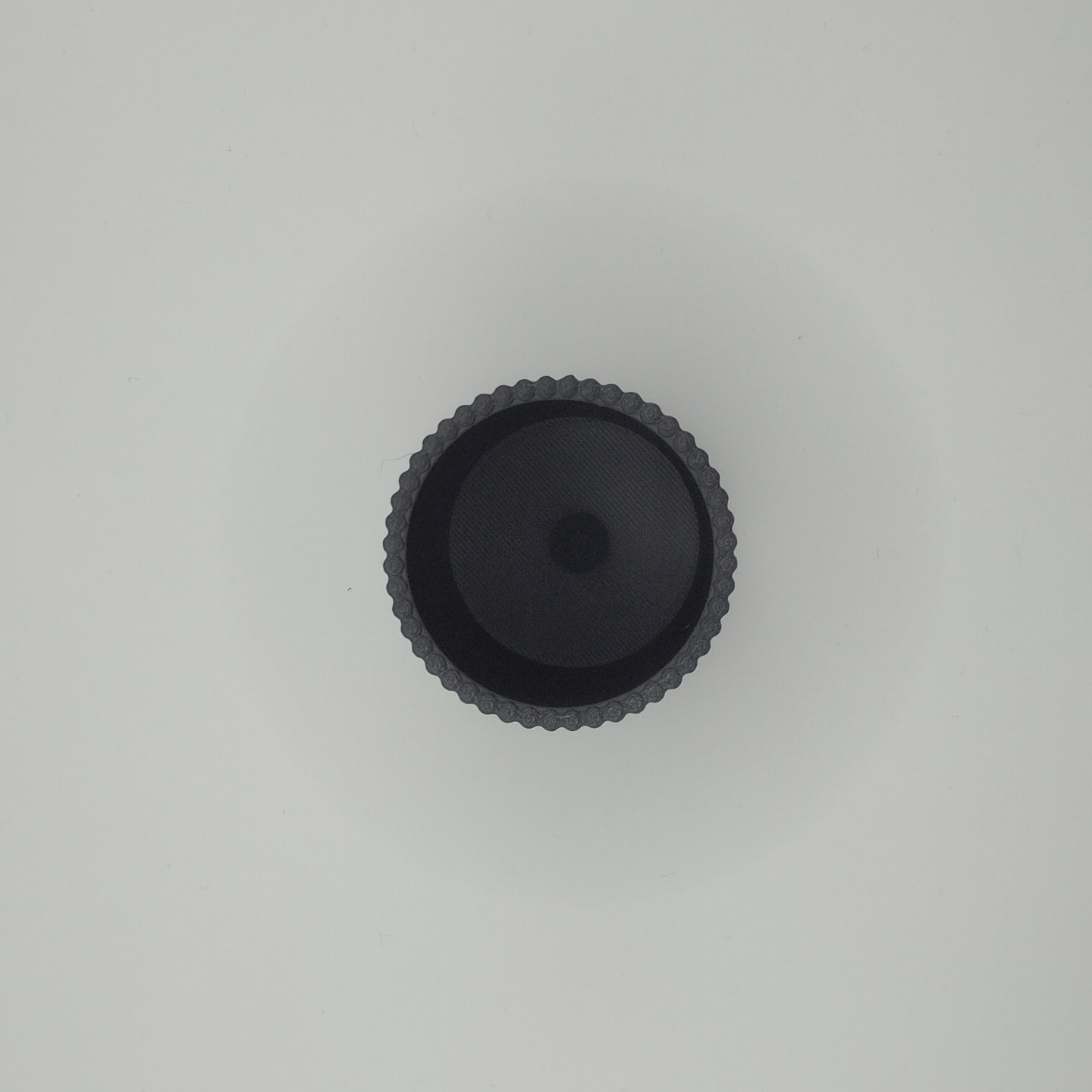 Refined ribbed surface of minimalist pencil holder catching light