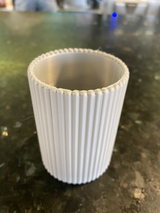 Close-up of ribbed pencil holder showing vertical texture detail