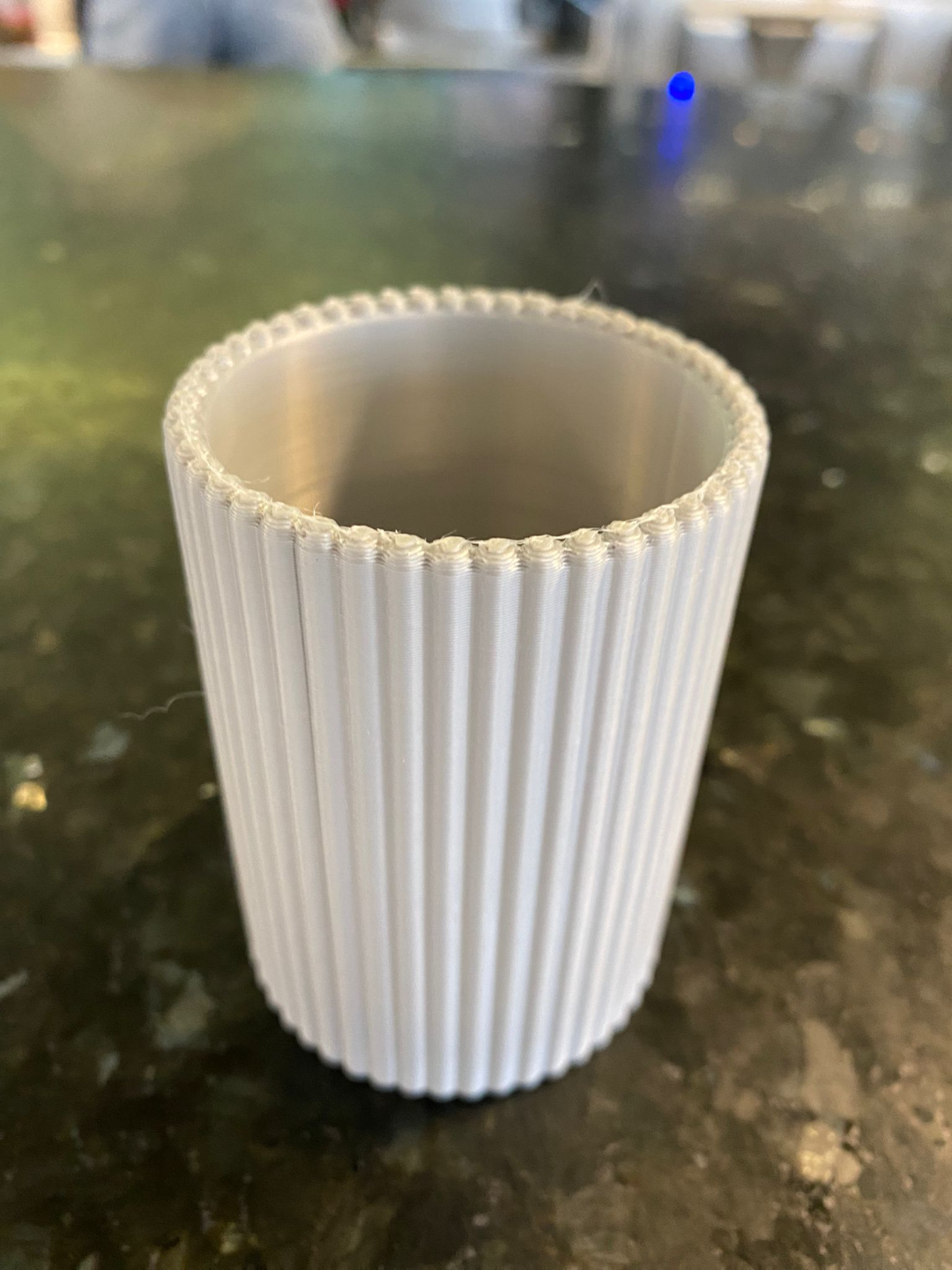 Close-up of ribbed pencil holder showing vertical texture detail