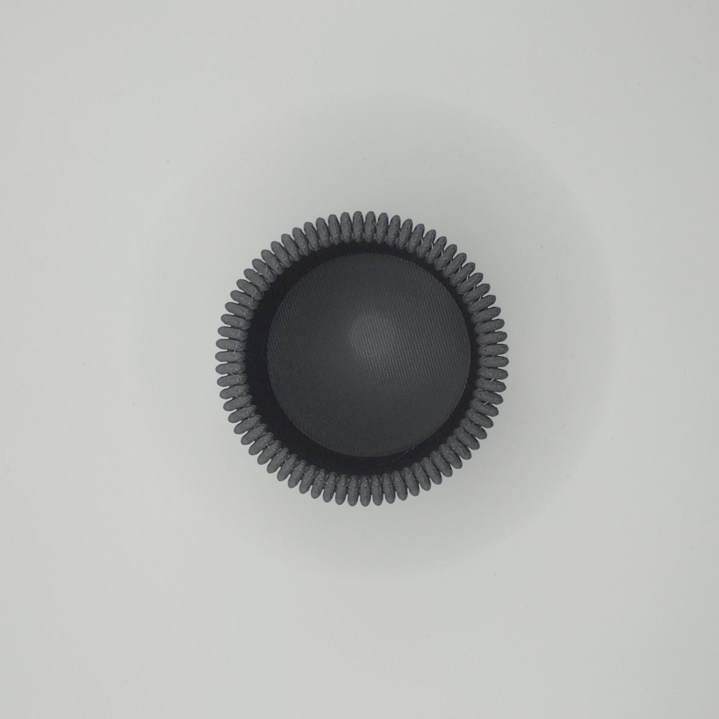 Detail of flat ribbed surface texture on minimalist pencil cup