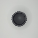 Detail of flat ribbed surface texture on minimalist pencil cup