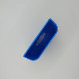 White wall-mounted phone holder with cable entry shown close-up