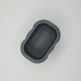 Close-up of the soft fuzzy surface texture on the minimalist sponge holder