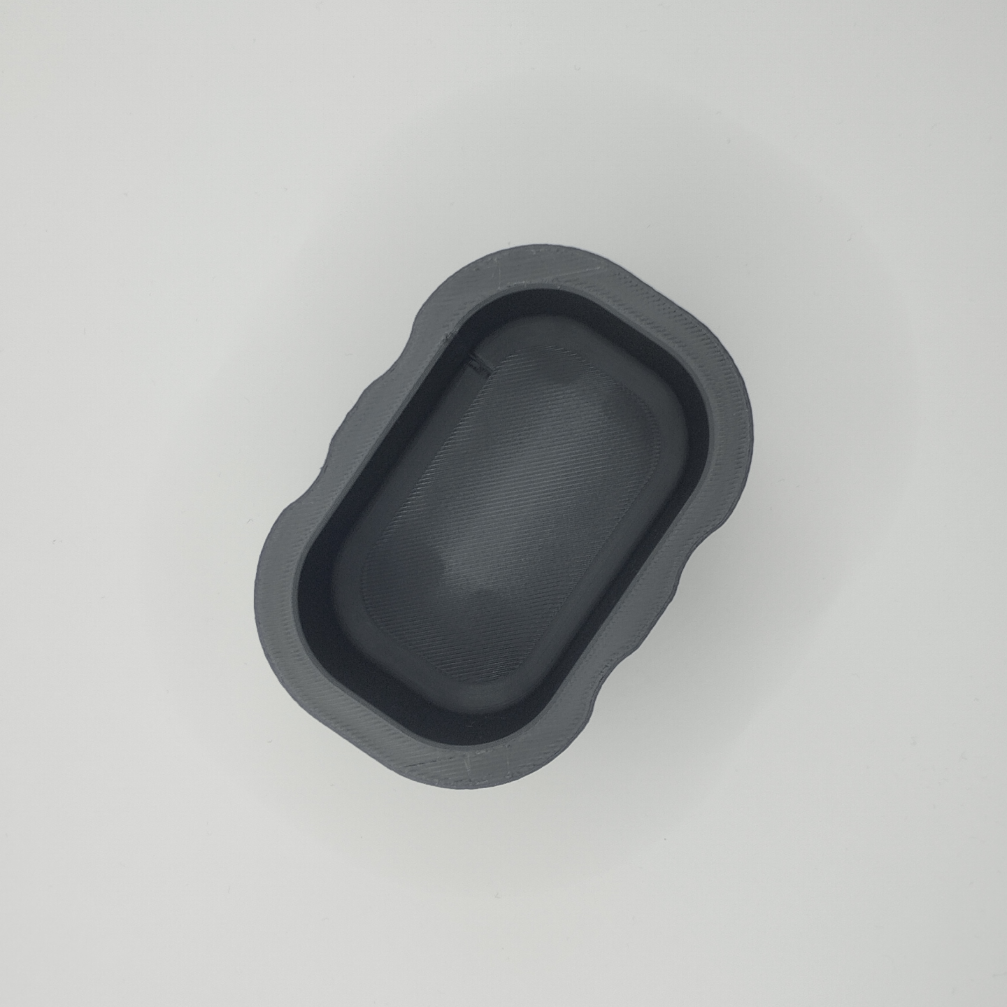 Close-up of the soft fuzzy surface texture on the minimalist sponge holder