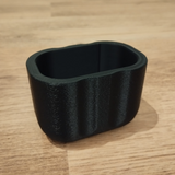 Fuzzy textured sponge holder with soft matte finish, pale neutral tone
