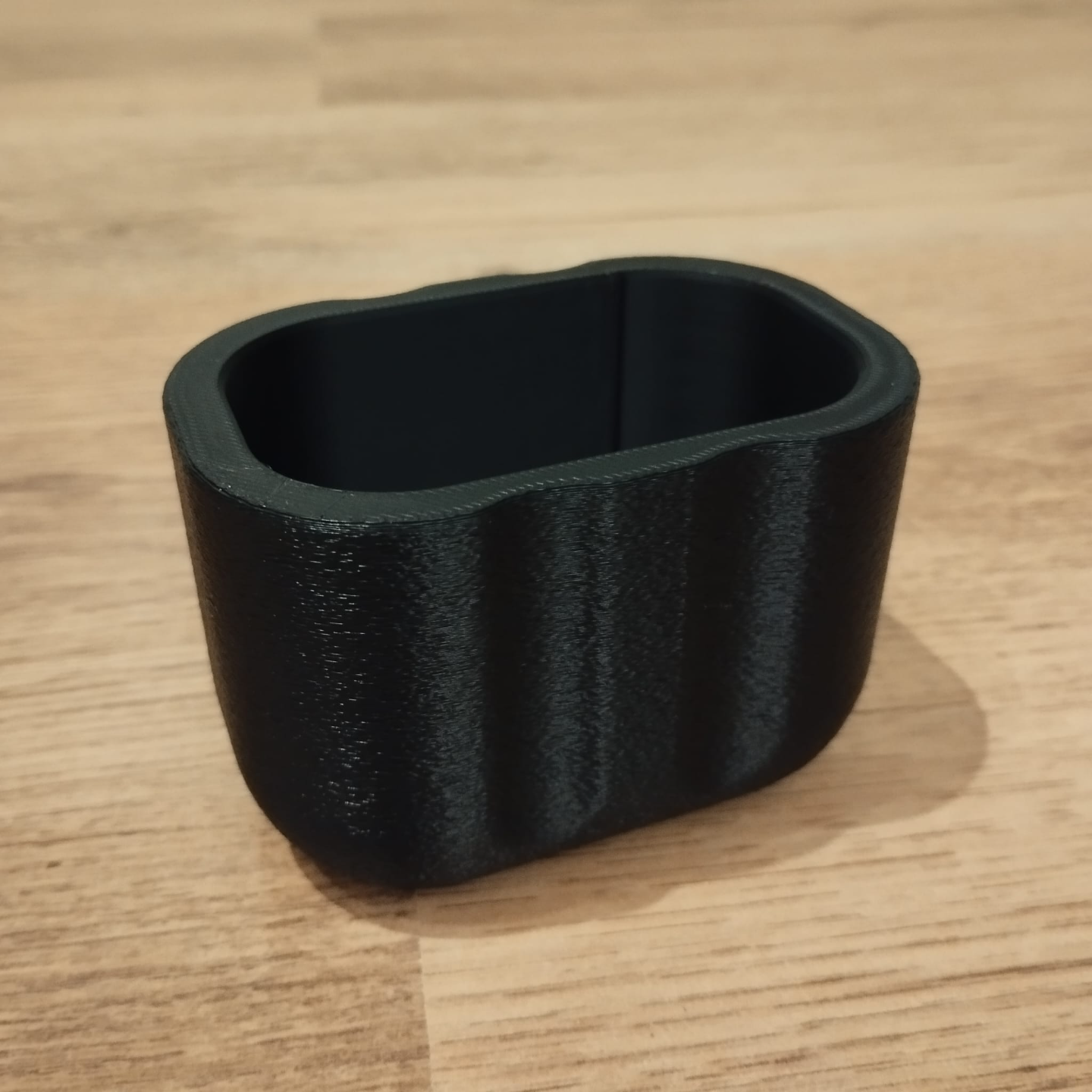 Fuzzy textured sponge holder with soft matte finish, pale neutral tone