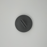 Close-up of the card holder's clean triangular edge and surface