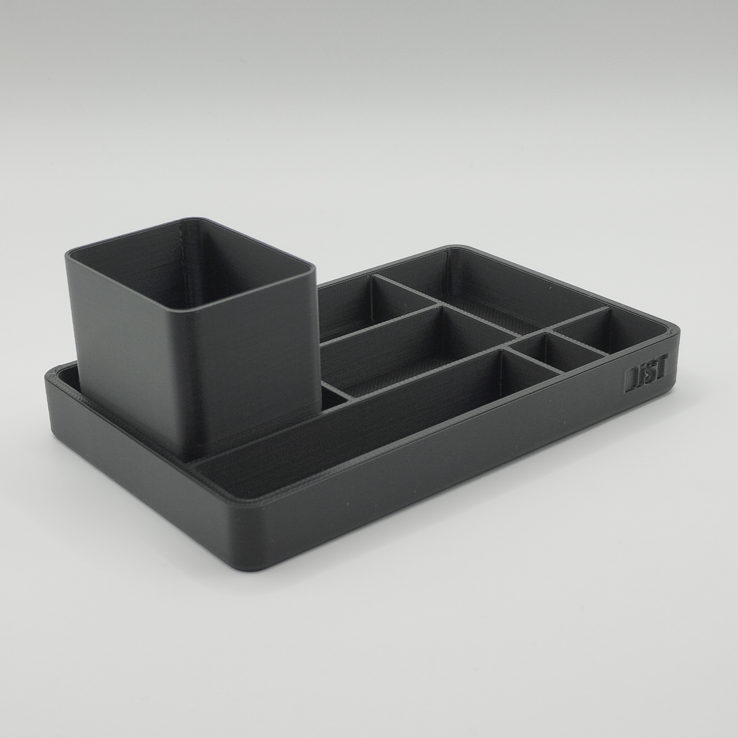 Office organizer tray with pencil cup styled on wooden desk in home office