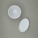 Detail of the curved edge of the soap dish toothbrush holder, showing smooth matte finish