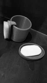 White soap dish and toothbrush holder set, front view with smooth minimalist design