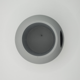 Close-up of self-watering chamber system showing water-level detail on plant pot