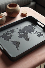 OneWorld designer tray with embossed world map continents, pale grey finish