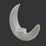 Close-up of crescent moon vase showing curved surface and integrated bowl detail