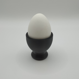 Detail of the smooth, refined surface texture of a modern egg cup