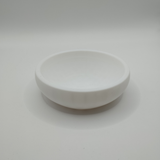 Minimalist key and coin catcher bowl styled on entryway table with scattered keys