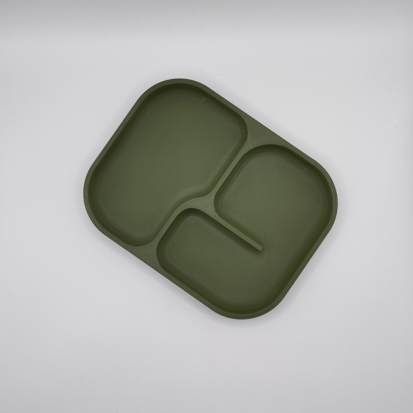 Empty catchall tray with Army Boy design, close-up view