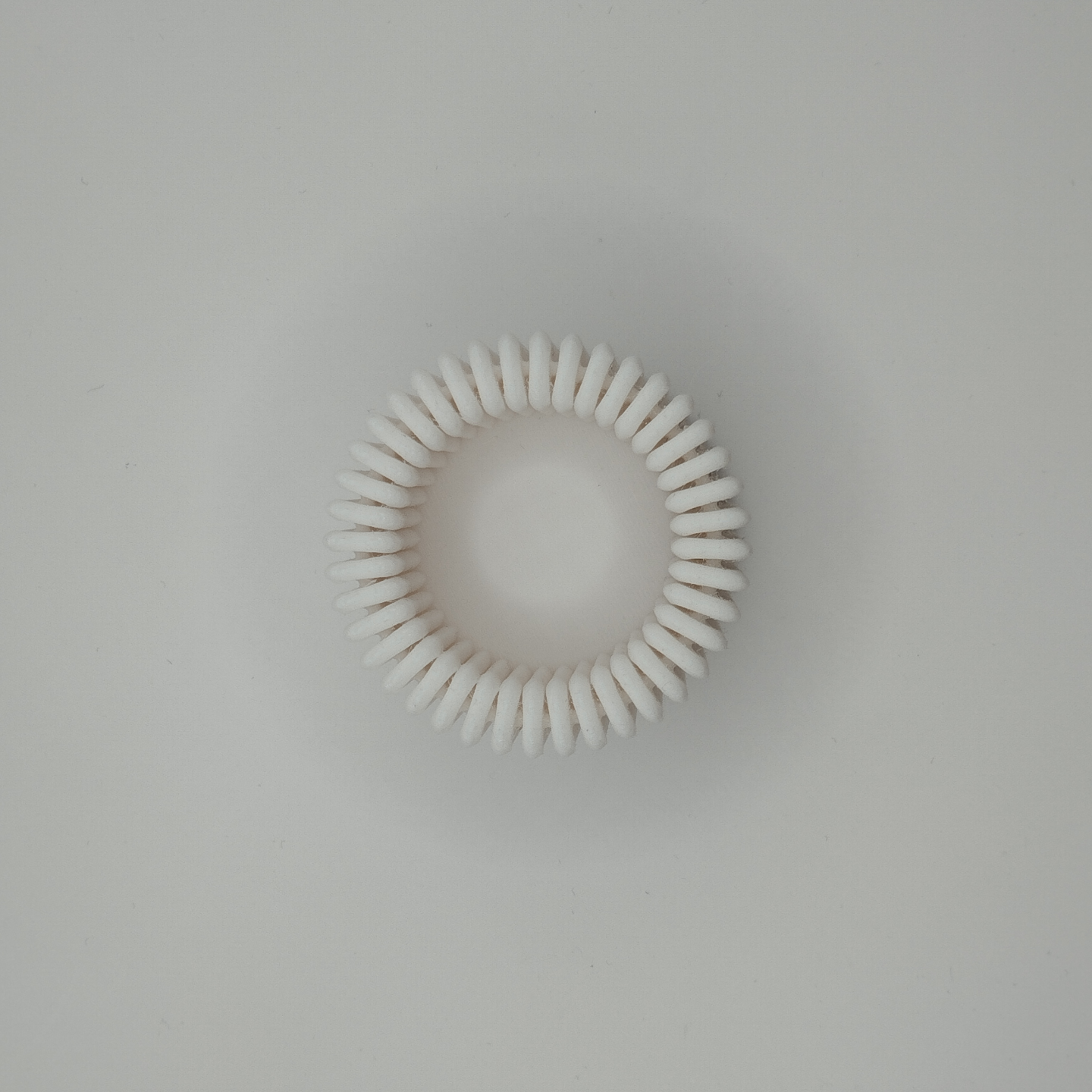 Close-up of ribbed tealight holder showing vertical texture and depth