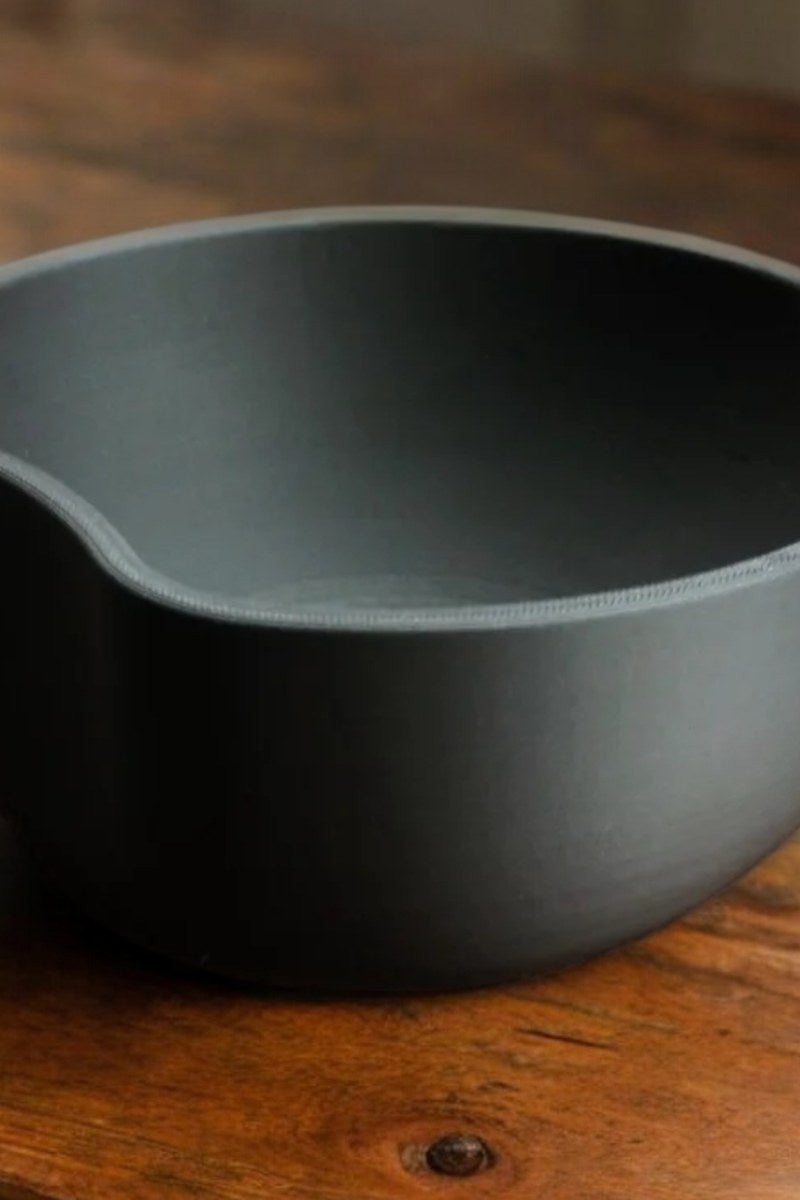Minimalist key catcher bowl with circular cut detail, neutral finish