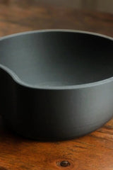 Minimalist key catcher bowl with circular cut detail, neutral finish