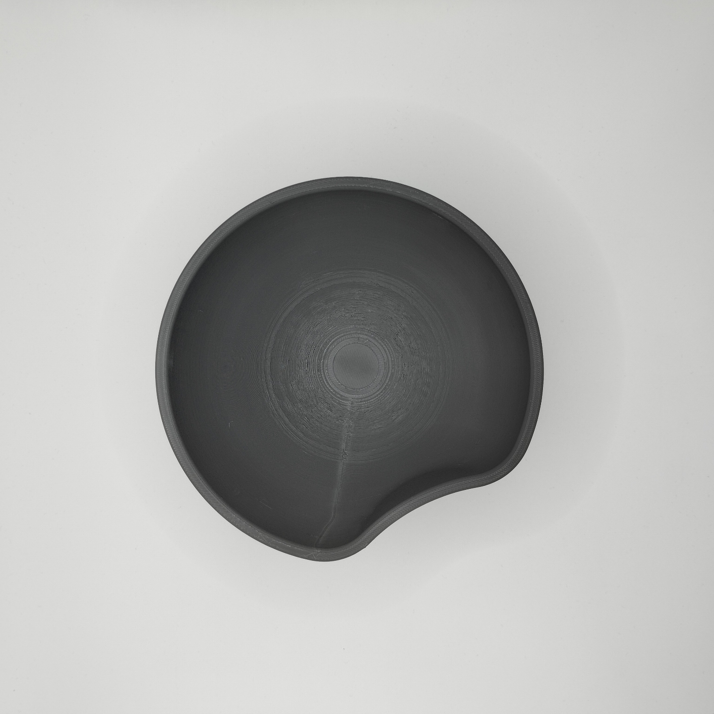 Close-up of the cut circle design detail on the key catcher bowl