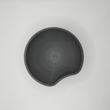 Close-up of the cut circle design detail on the key catcher bowl