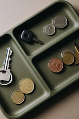 Close-up of Army Boy II key and coin tray with angular edges