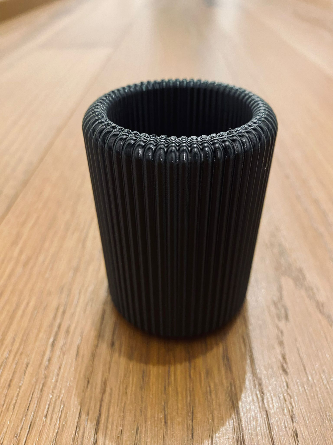 Close-up of ribbed toothbrush holder showing vertical texture detail
