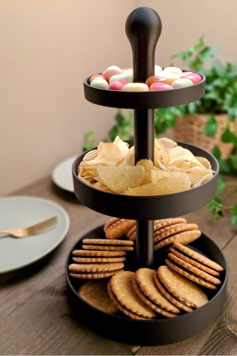 Close-up of three-tier cake stand showing geometric proportions and clean lines