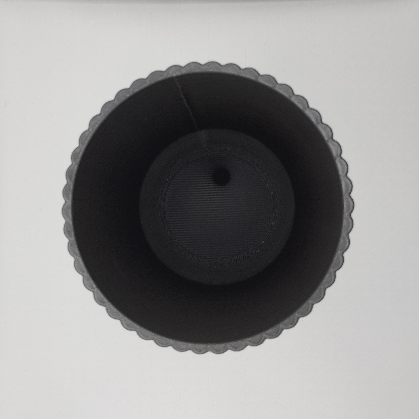 Ribbed utensil holder with vertical texture detail, close-up view
