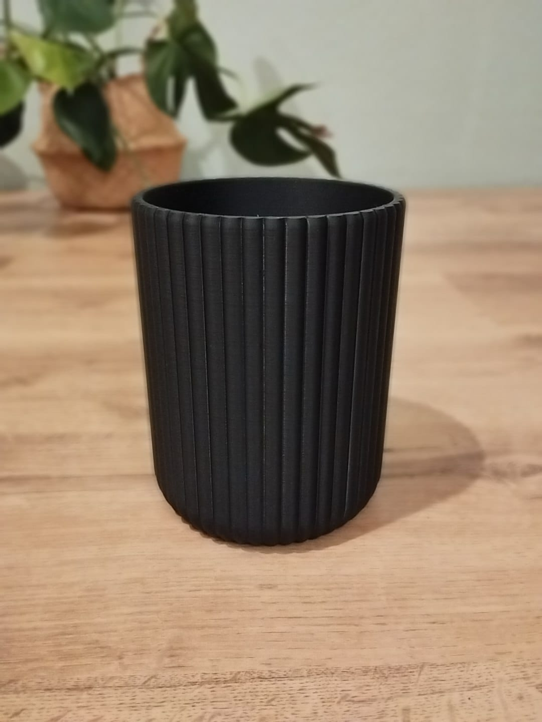 Ribbed utensil holder with vertical texture detail, close-up view