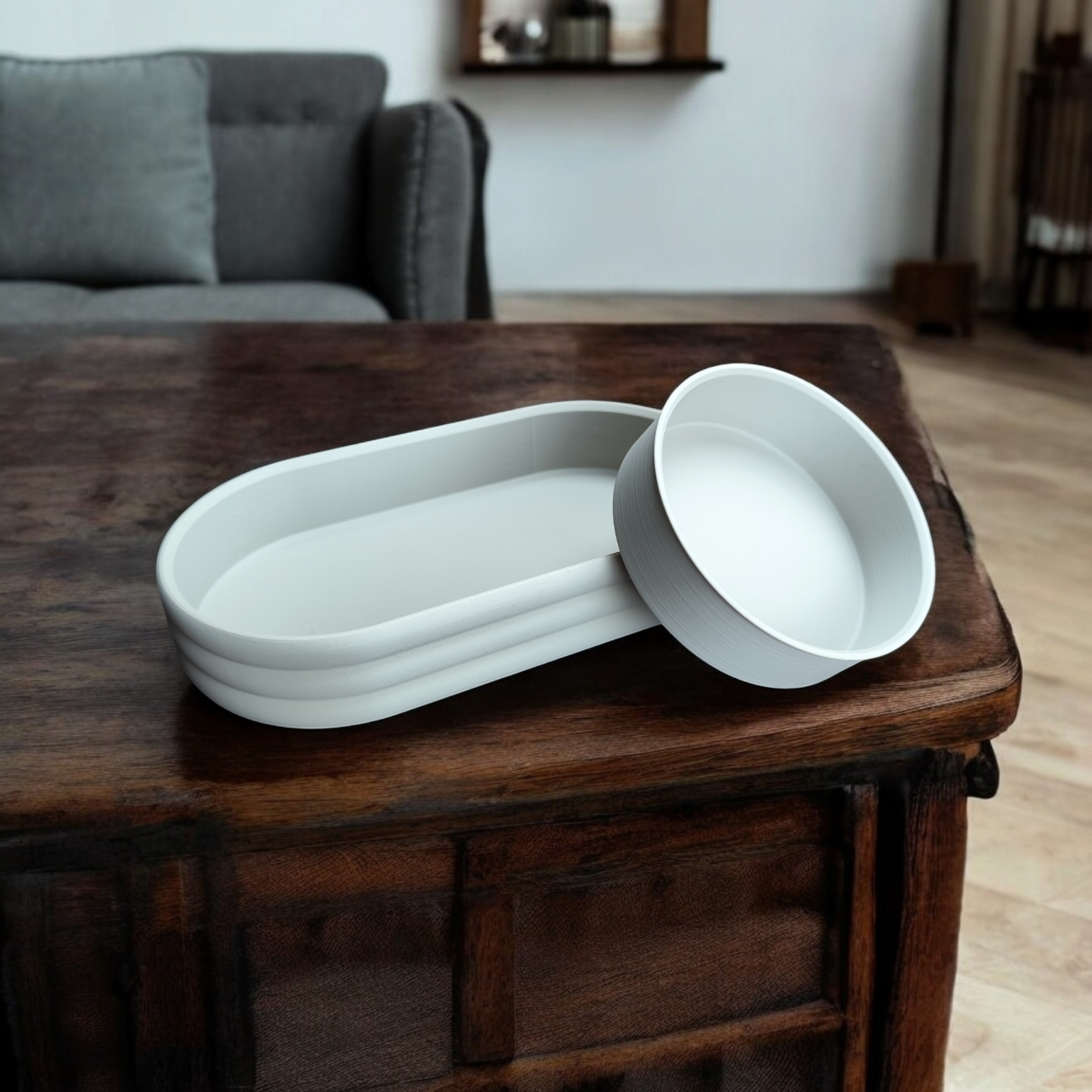Mid-century tray with horizontal ribbed texture and sliding coin bowl, close-up view