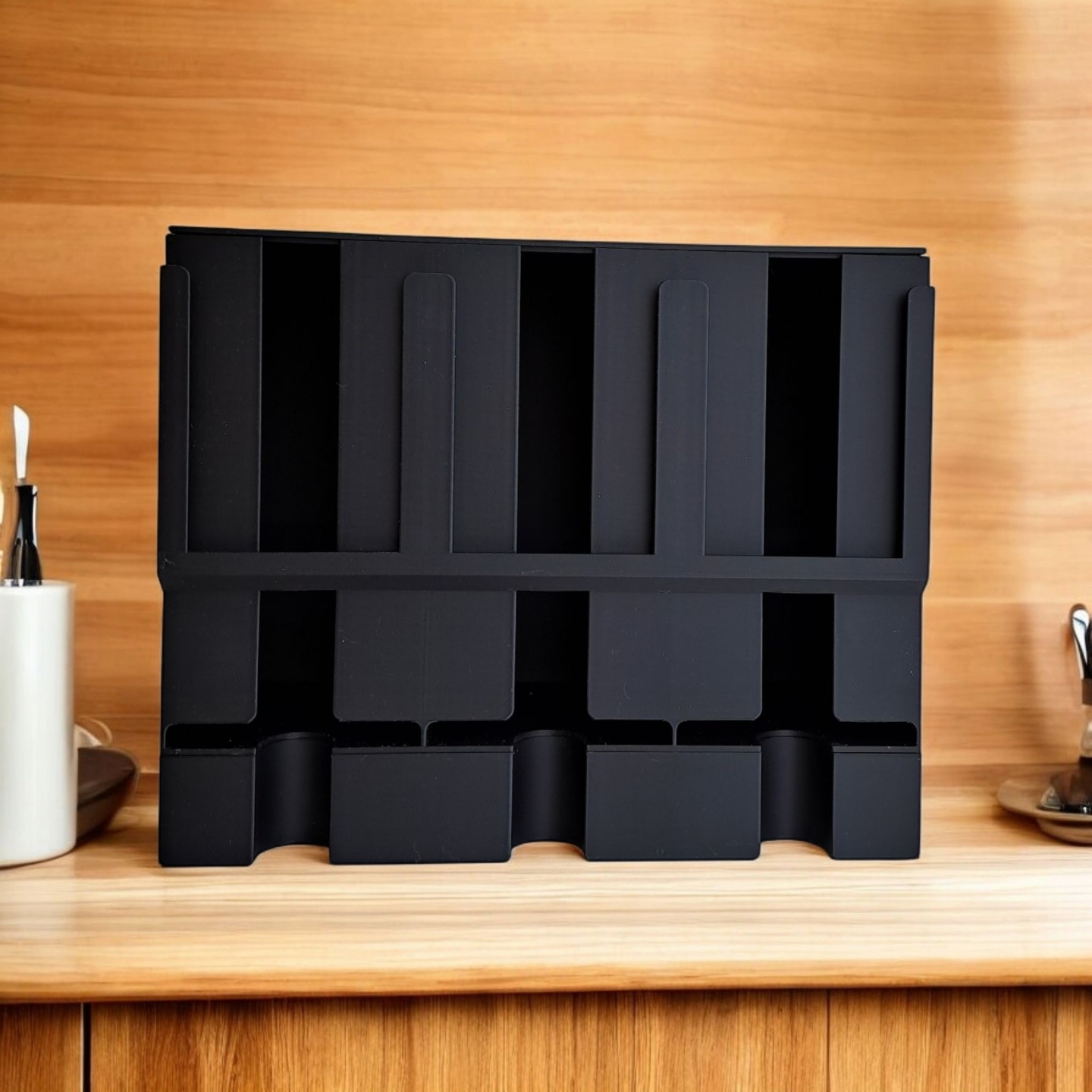 Minimalist tea organizer displayed on a kitchen shelf with tea collections