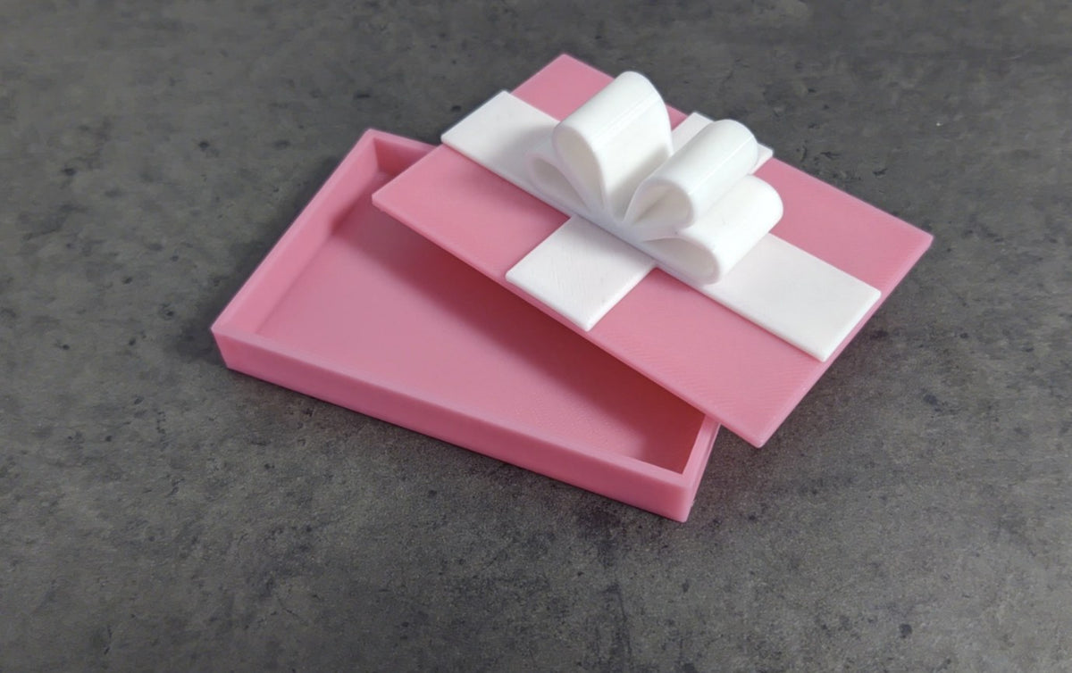 Kleine Geschenkkartenbox mit Deckel in Schleifenform