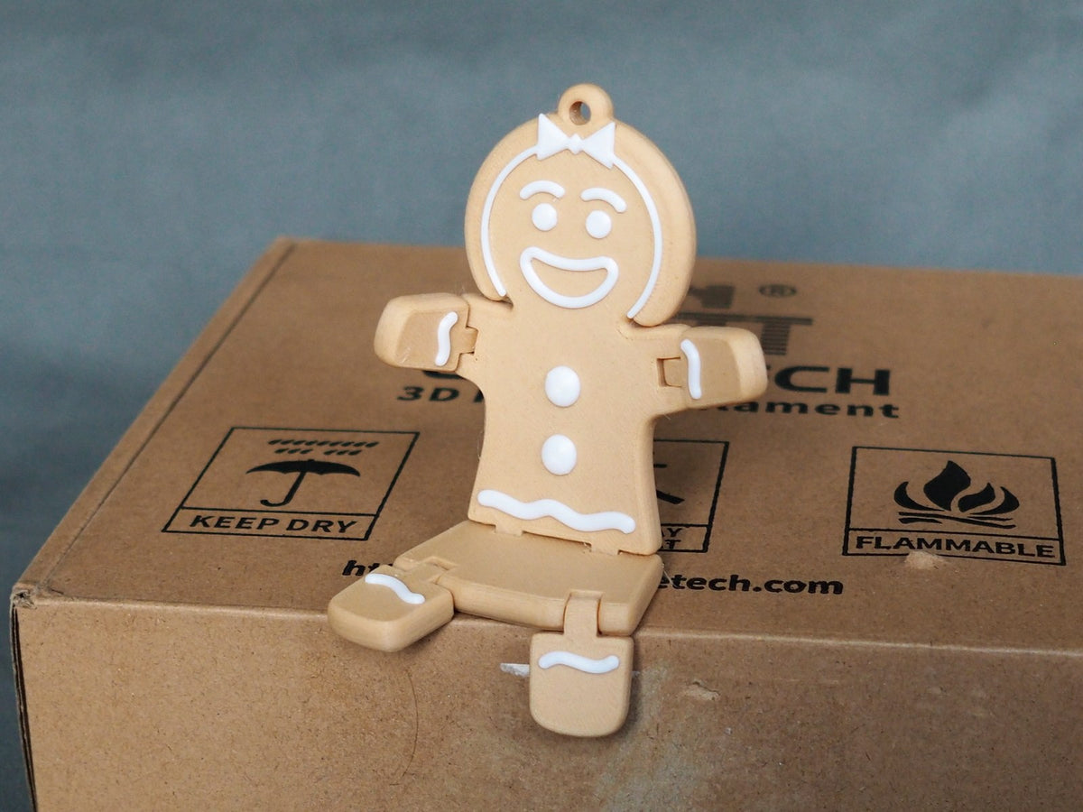 Lebkuchenfrau-Figur zu Weihnachten in Braun und Weiß