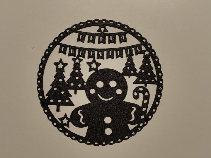 Lebkuchenmann-Silhouette als weihnachtliche Wanddeko
