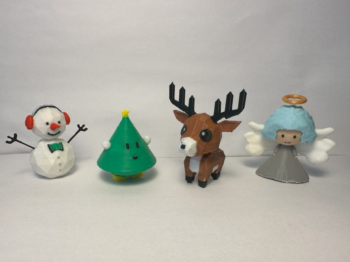 Weihnachtsfiguren-Set mit Schneemann, Weihnachtsbaum, Rentier und Engel
