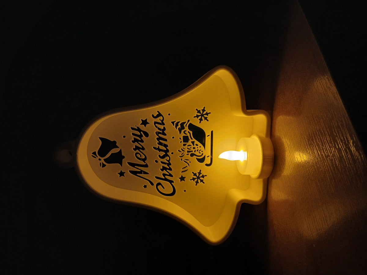 Weihnachtsglocke mit Ausschnitten und LED-Teelicht