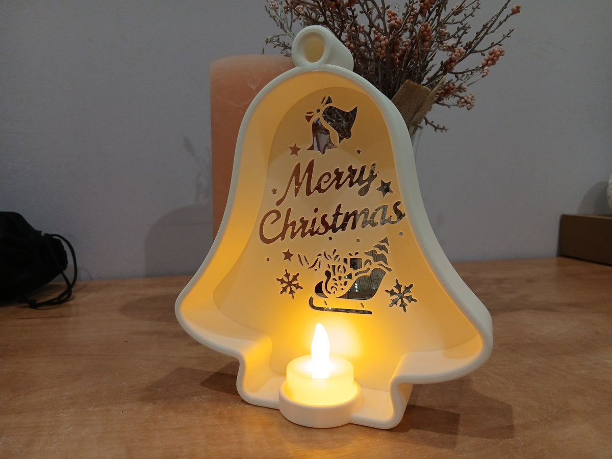 Weihnachtsglocke mit Ausschnitten und LED-Teelicht