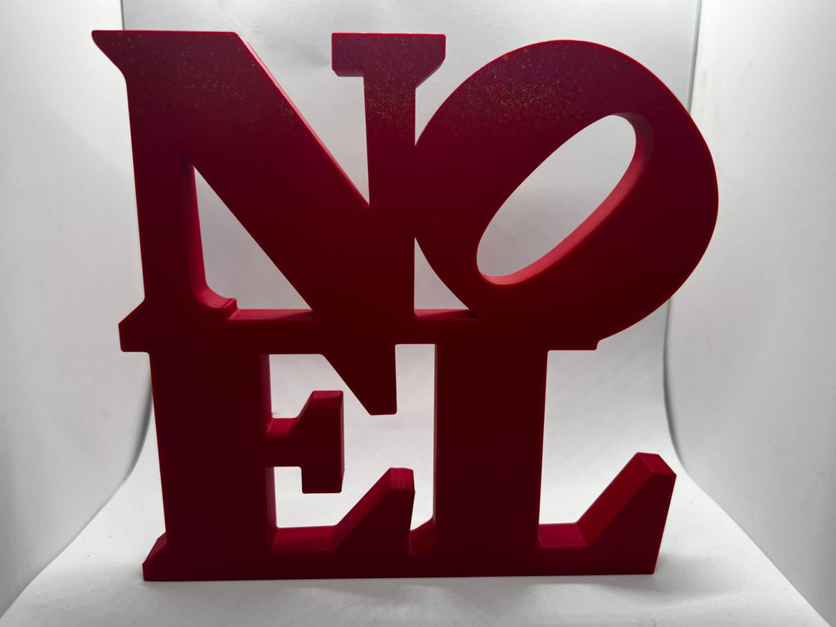 Weihnachtsdeko mit dem Wort NOEL