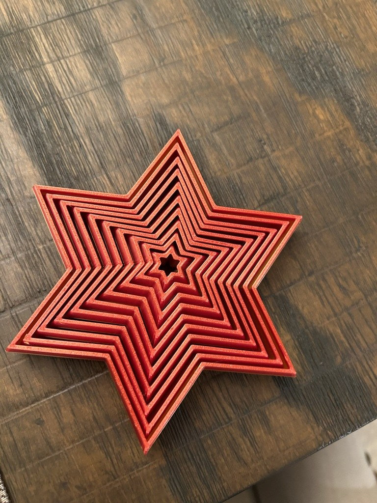 Faltbarer sechszackiger Weihnachtsstern in mehreren Farben