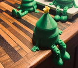 Kleine grüne Weihnachtsbaumfigur mit gelbem Stern