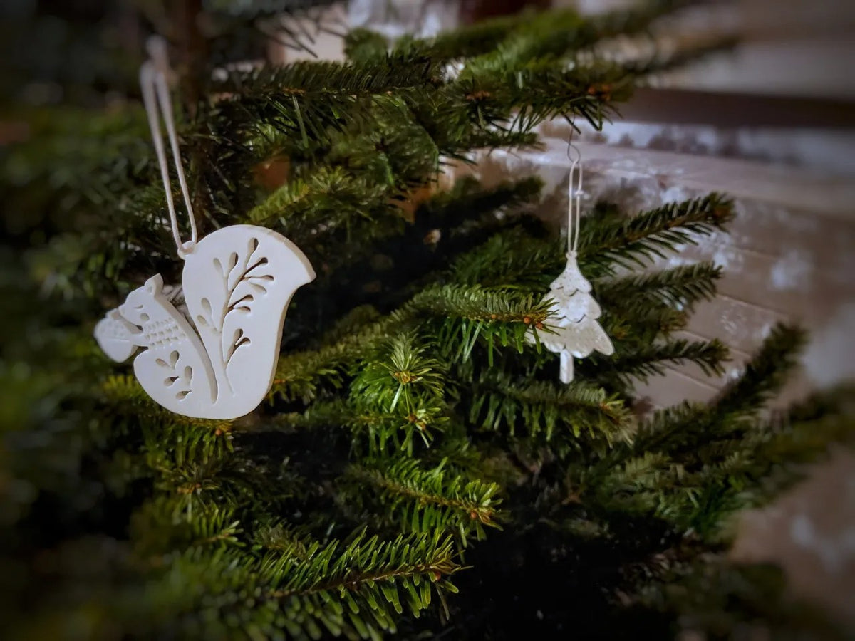 Acht Christbaumanhänger in Tierform