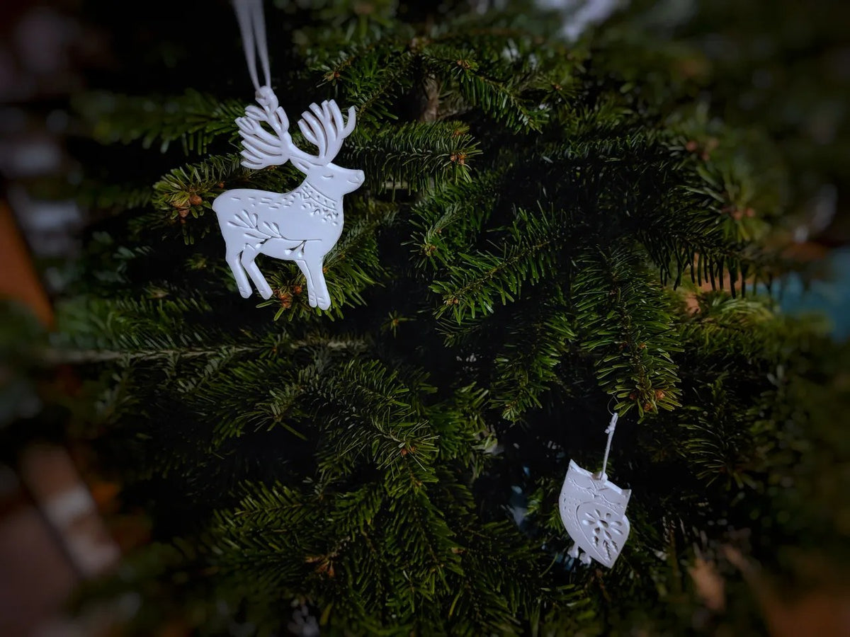 Acht Christbaumanhänger in Tierform