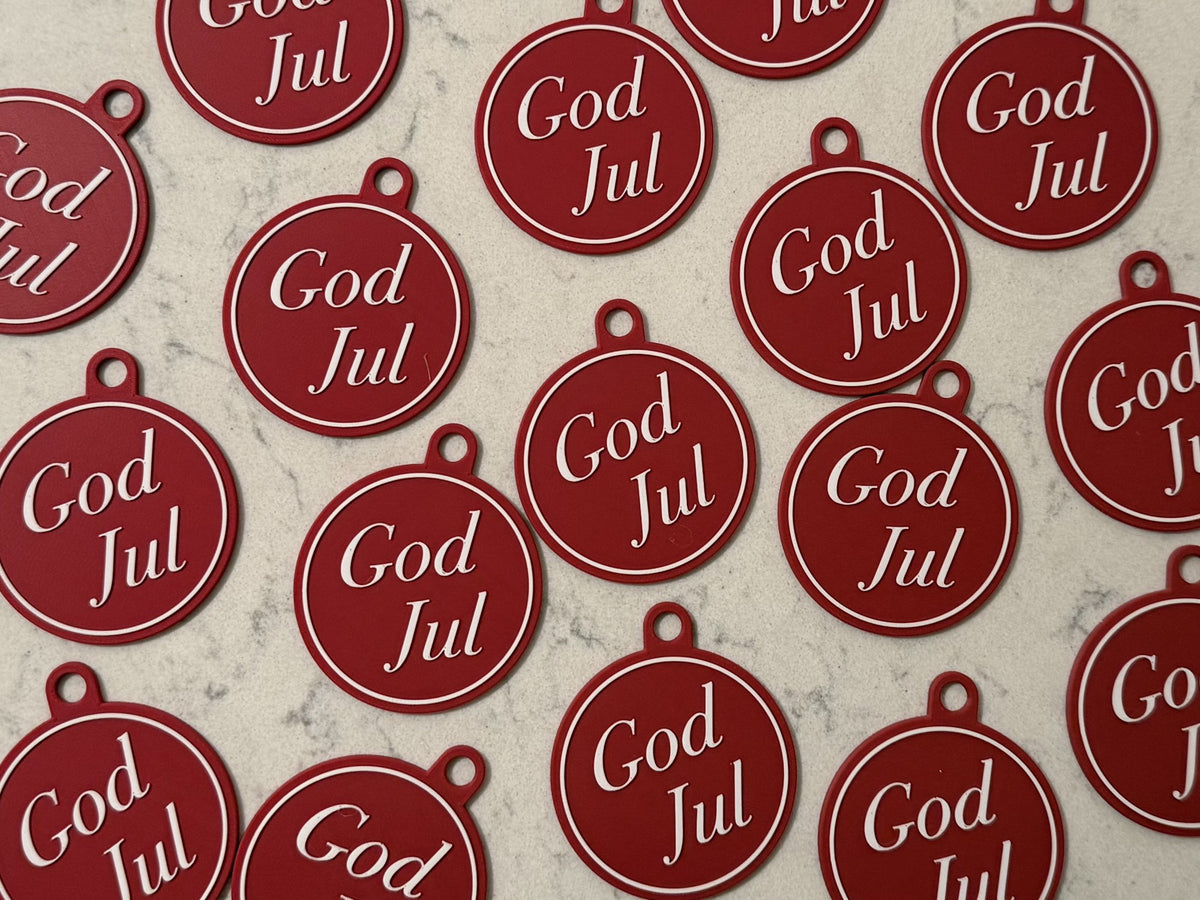 Eleganter Christbaumschmuck mit dem Text God Jul