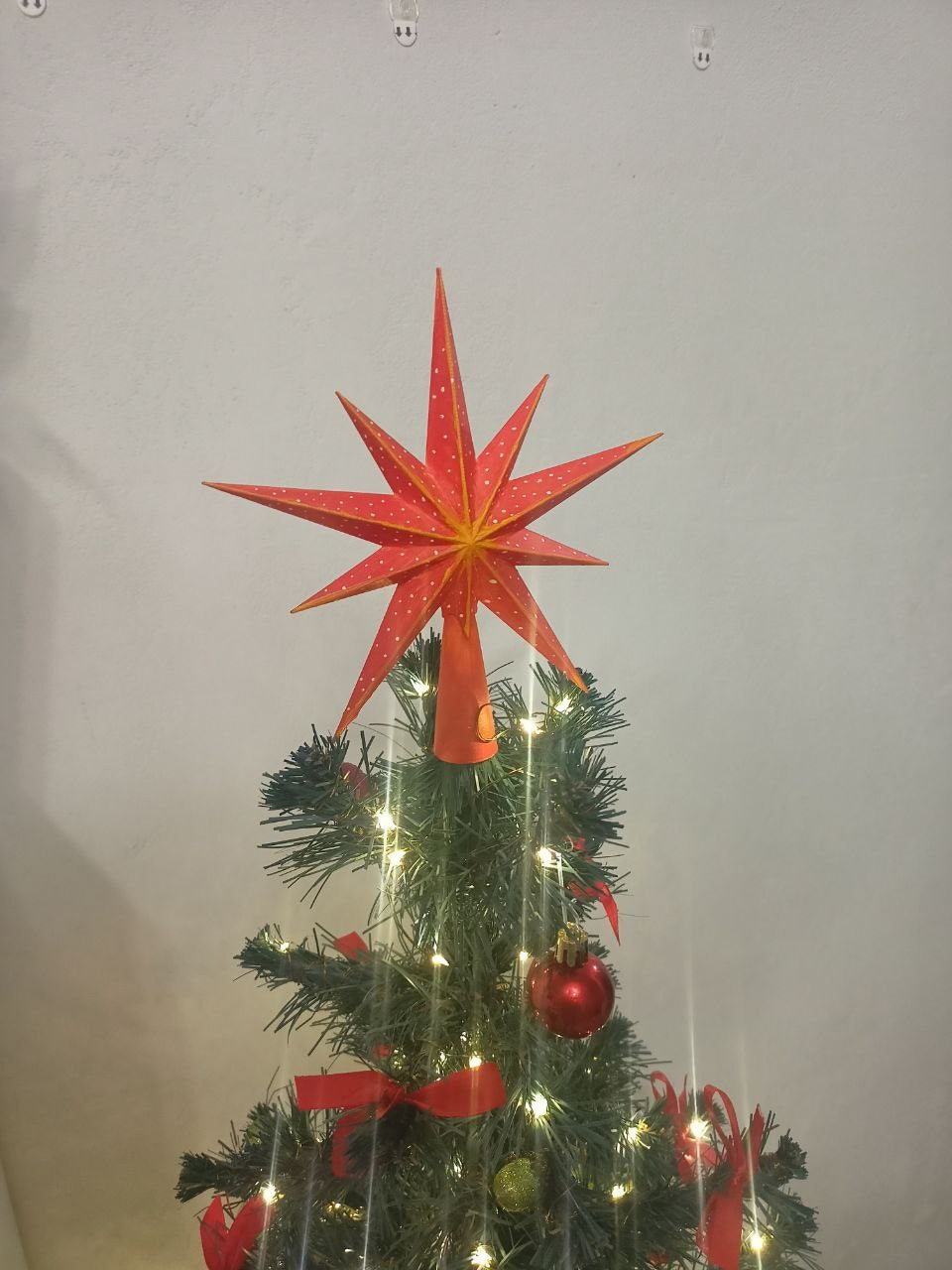 Christbaumspitze als Stern mit zehn Zacken