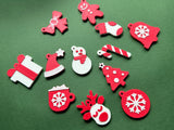Zwölf Schlüsselanhänger mit Weihnachtsmotiven