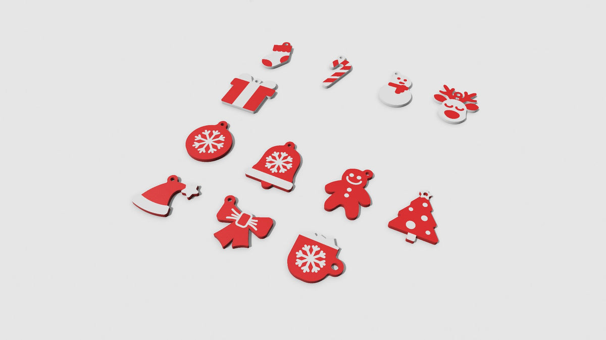 Zwölf Schlüsselanhänger mit Weihnachtsmotiven